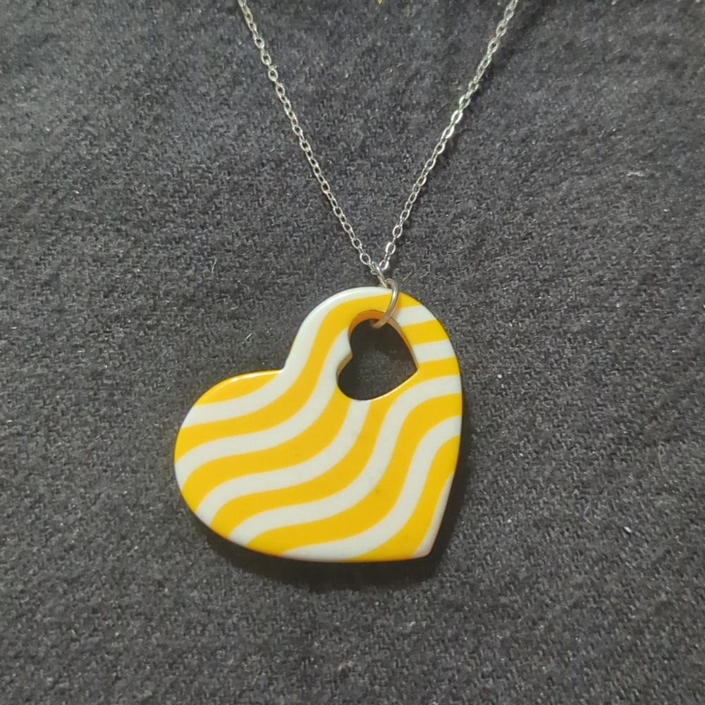 Silver Tone Yellow and White Wavy Stripe Heart Pendant Statement Necklace